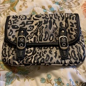 Grace Adele Leopard print clutch.